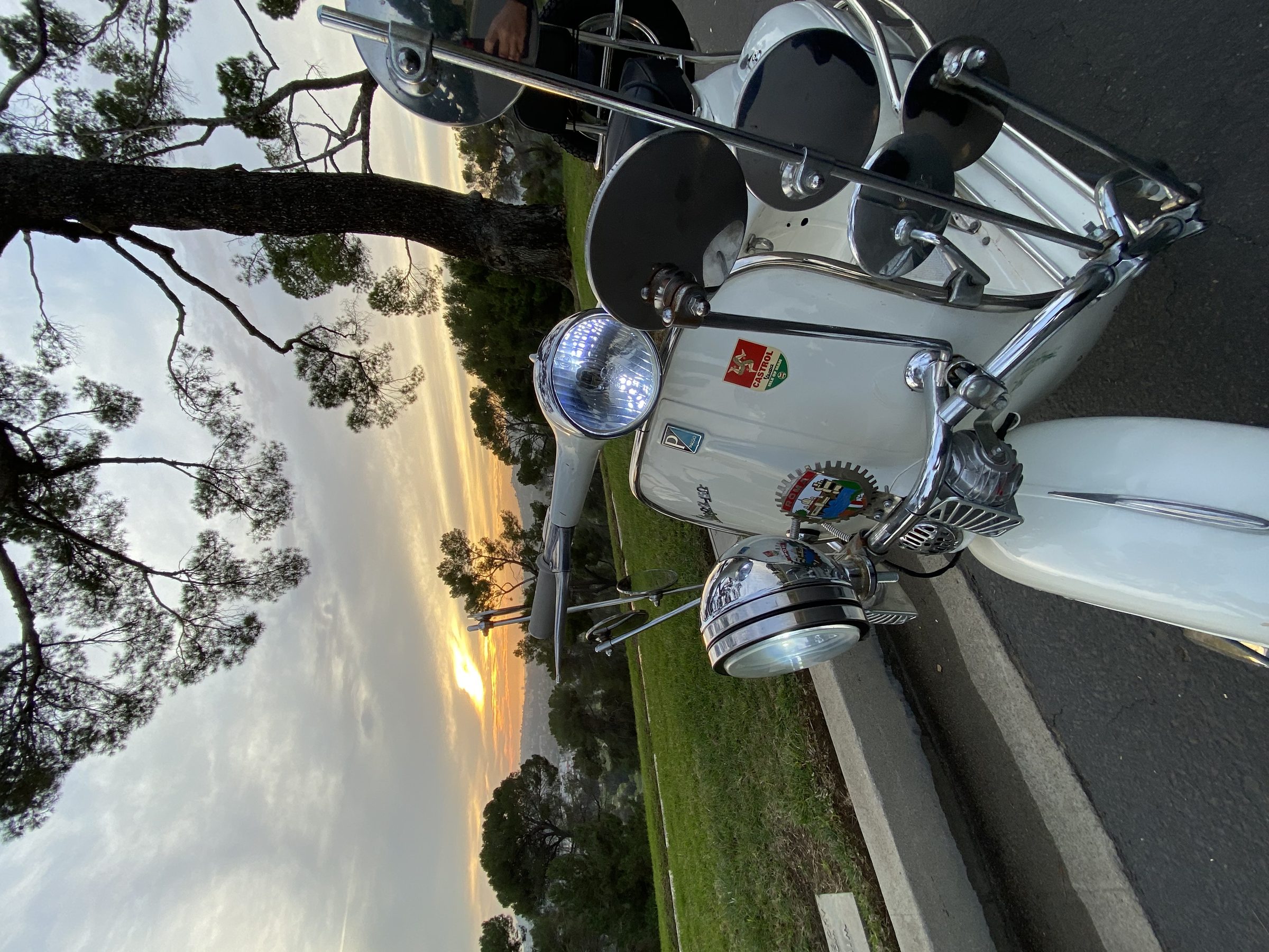 Vespa detail — sunset